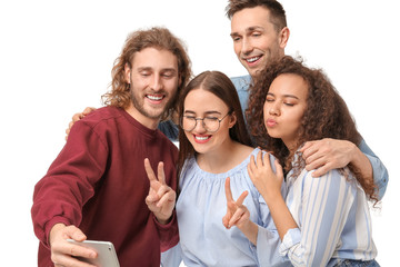 Friends taking selfie on white background