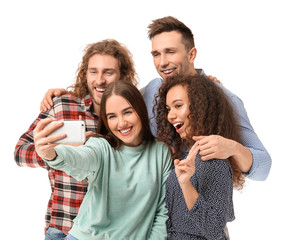 Fototapeta premium Friends taking selfie on white background