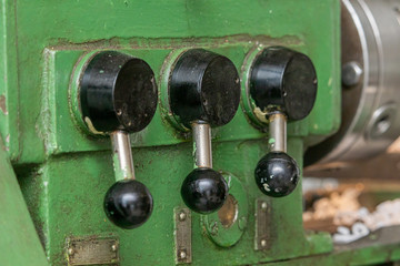 Various controls of the old lathe.