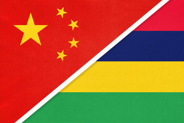 China or PRC vs Mauritius national flag from textile. Relationship between Asian and African countries.