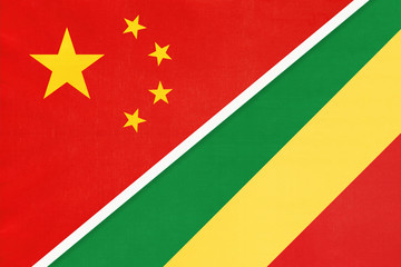 China or PRC vs Congo national flag from textile. Relationship between Asian and African countries.