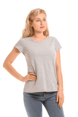 Obraz premium Woman in stylish t-shirt on white background