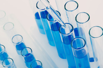 A pipette that adds fluid to one of several tubes. Lab tests