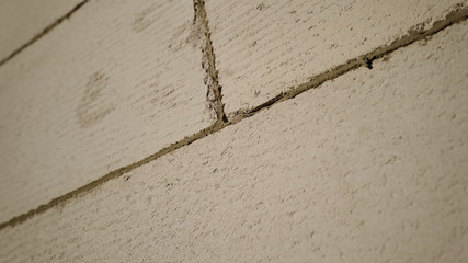 Cement seam between building blocks