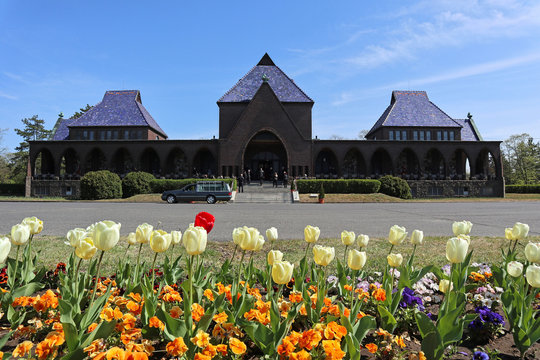 Building of the crematorium with flowers