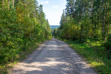 Fototapeta na wymiar Road to the Urenga mountain range near Zyuratkul national Park. Chelyabinsk region, South Ural, Russia