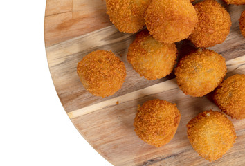 Dutch traditional snack bitterbal on a serving board