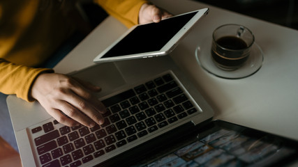 Business and office concept,businessman planning work using tablet and laptop online.