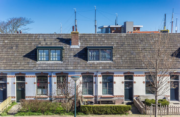 Front of white houses at the harbor of Harlingen, Netherlands