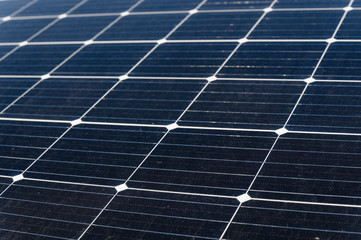 Dusty solar panel boards in detail.