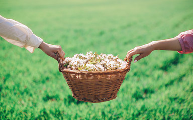 farmer holding a basket of rice