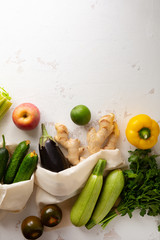 Buying fvegetables with eco bags, zero waste concept