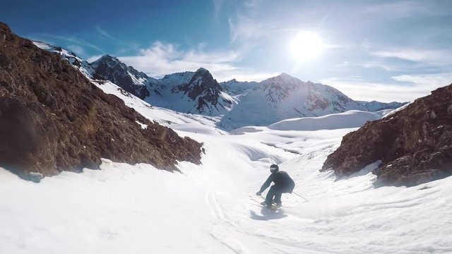 funny advertising video of a man ski fail falling over on skis after doing a big jump and landing on his back whilst on a winter ski holiday in the french alps