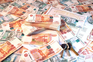 Background of banknotes of five and one thousand Russian rubles with keys