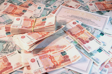 Background of banknotes of five and one thousand Russian rubles with keys