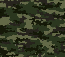 Fototapeta premium Green military camouflage pattern forest background. Vector