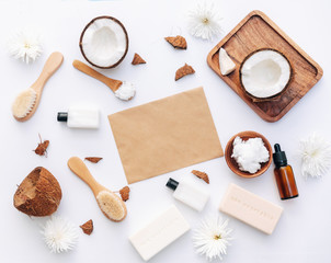 Fototapeta na wymiar Flat Lay Organic healthy coconut butter with coconut pieces over white background, body care products