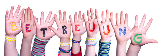 Kids Hands Holding Colorful German Word Betreuung Means Day Care. White Isolated Background