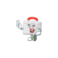Cheerful first aid kit mascot design with two fingers
