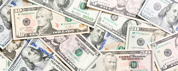 Top view of various dollar cash background. Different banknotes concept. Wealth and rich concept