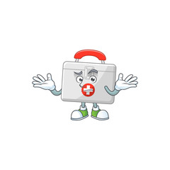 An image of first aid kit in grinning mascot cartoon style