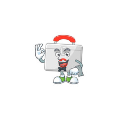 A first aid kit waiter cartoon character ready to serve