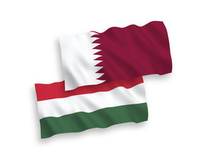 Flags of Qatar and Hungary on a white background
