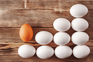 The orange egg begins to climb up the ladder of white eggs. Early career.