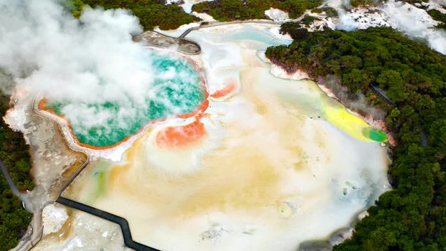 Geothermal Landscape with hot boiling mud and sulphur springs due to volcanic activity in Wai-O-Tapu, Thermal Wonderland New Zealand