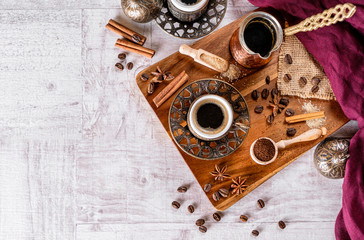 Top down view of a hot coffee cup on white background. Copy space