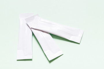 Set of white disposable packaging for snacks, food, sugar and spices. Sachets for medicines