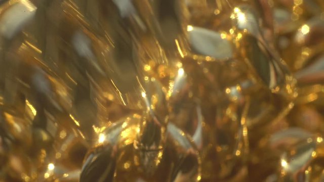 grabbing gold chain up close