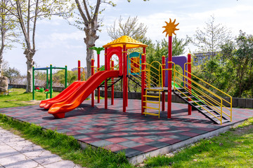 Empty colorful playground in the park during coronavirus. Poti