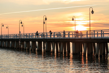 A pier in the setting sun