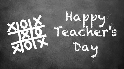 Tic-tac-toe game and Happy Teacher's Day text written in chalk on blackboard