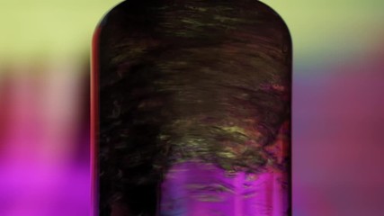 Wooden stick stirring two different liquid substances in chemistry lab jar very fast while creating whirlpool made of hundreds of bubbles. - Powered by Adobe