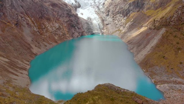 Arhuaycocha lake, in the santa cruz treking, peruvian andes, travel right aerial shot.