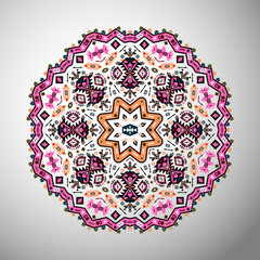 Ornamental round colorful geometric pattern in aztec style