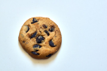 Three cookies with chocolate crumbs isolated
