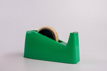 office stationary scotch tape dispenser isolate on white background