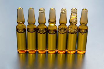 medical ampoules for injection. medicines and disease treatment. pharmacology and science