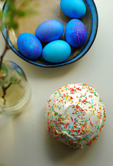 Traditional Orthodox Easter bread Kulich and blue eggs