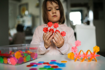 calm concentrated kid developing plastic designer