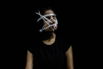 Distortion of face wrapped in plastic