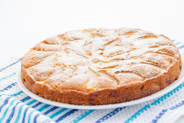 details of fresh baked apple pie on white background