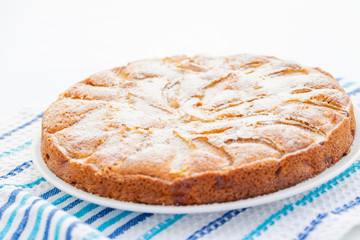 details of fresh baked apple pie on white background