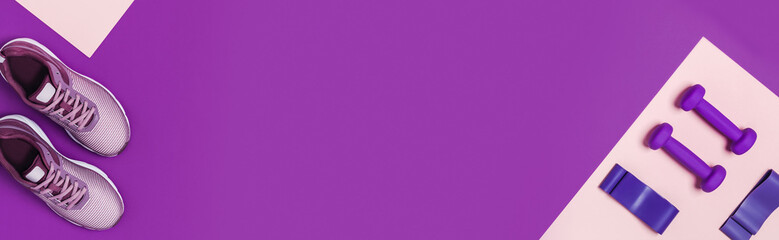 Sports equipment for women's training. Pink-purple background, diagonal composition.
