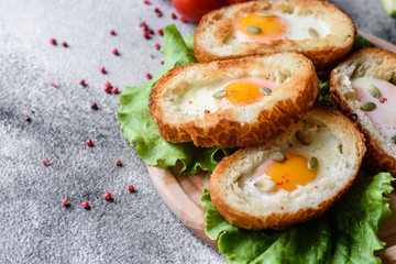 Delicious breakfast with grunts, eggs, avocado and cherry tomatoes