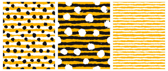 Simple Rough Dots and Stripes Seamless Vector Patterns. White Hand Drawn Brush Dots Isolated on a  Striped Background. Infantile Style Geometric Repeatable Print. White Stripes on a Yellow Layout. 