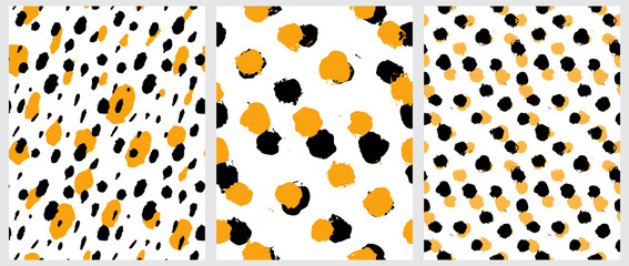Simple Freehand Spots Seamless Vector Patterns. Warm Yellow and Black Hand Drawn Brush Dots Isolated on a  White Background. Rough Irregular Geometric Print for Fabric, Textile. 